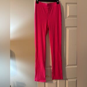 New w/out tag. Hot pink pull-on stretch flared pants. Size L.